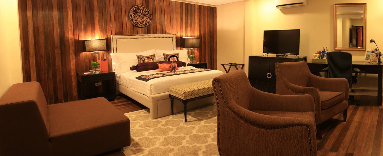 The Oriental Luxury Suites Batangas Room photo