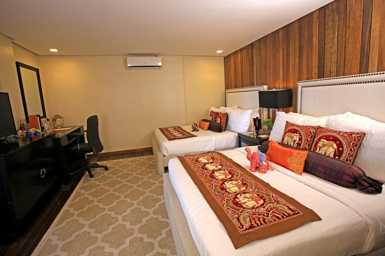 The Oriental Luxury Suites Batangas Room photo